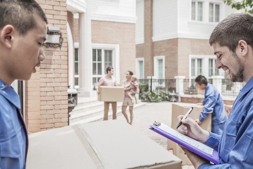 Moving planning for home moves in Greenwich with boxes and checklist