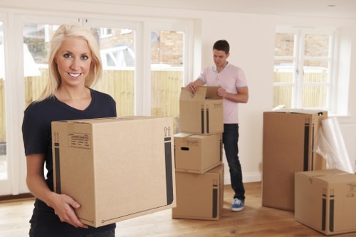 Packed office equipment ready for transport during a Greenwich business move