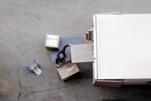 Careful piano transport through a Greenwich property
