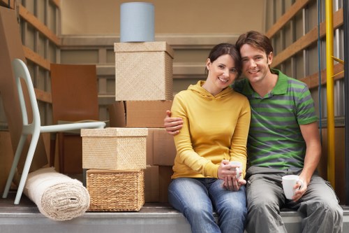 Professional movers handling furniture during a local relocation