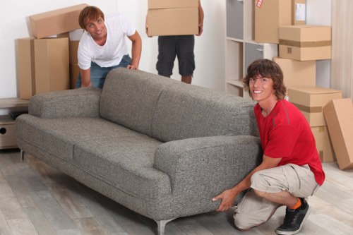 Packed boxes and furniture ready for a cubic-yard based home removal