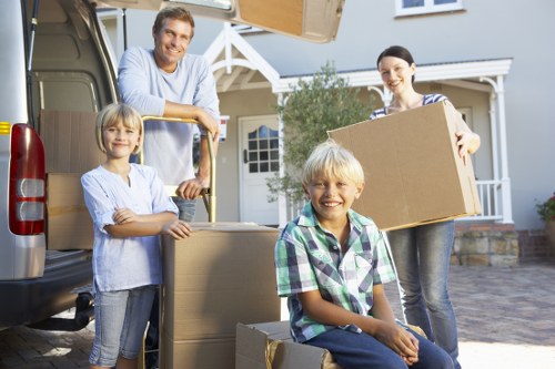 Professional movers working in a Greenwich street