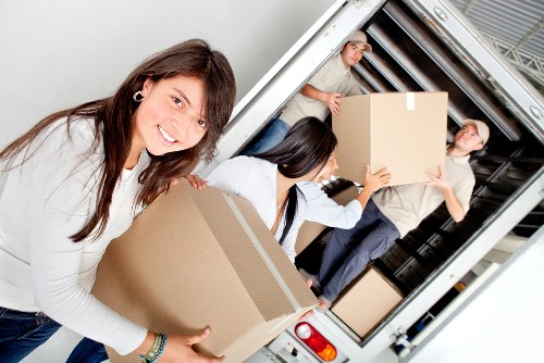 Moving crew reviewing safety checks before completing the removals job