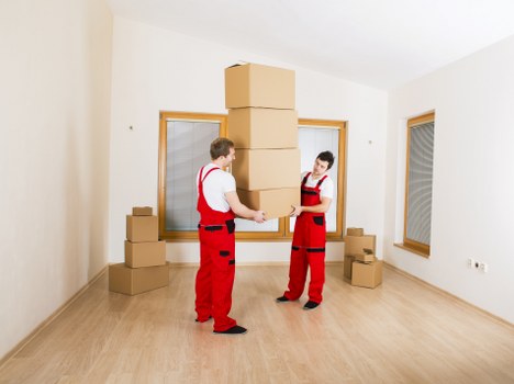 Local Greenwich moving service handling boxes and items